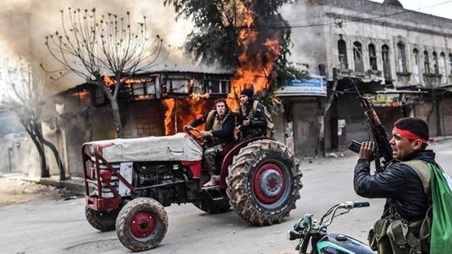 Komên Çekdar ku girêdayî Tirkiyê, li Girê Spî mal û milkê welatiyekî talan kirin