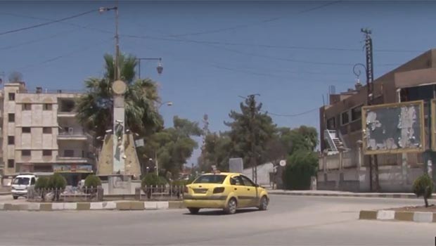 Rojava'da bayraklar indiriliyor