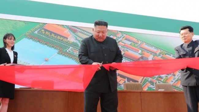 Öldüğü iddia edilen Kim Jong-un fabrika açılışına katıldı