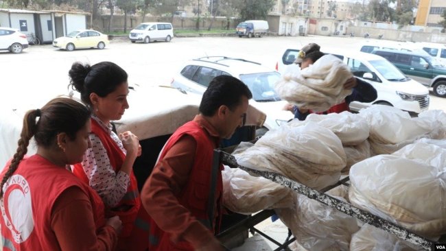 Kürt Kızılayı'ndan Rojava'da Ekmek Dağıtım Kampanyası